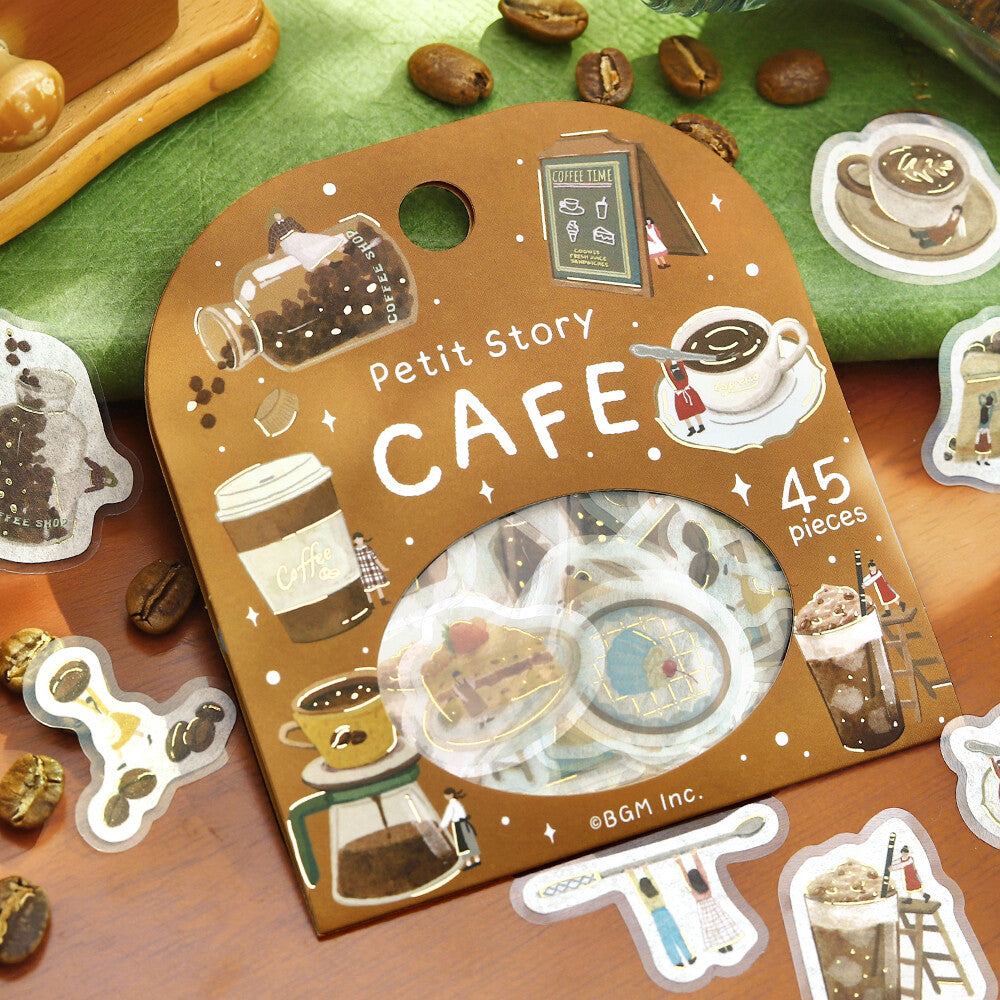 Packaging of 'Petit Story Cafe' stickers with coffee-themed illustrations on a wooden surface.