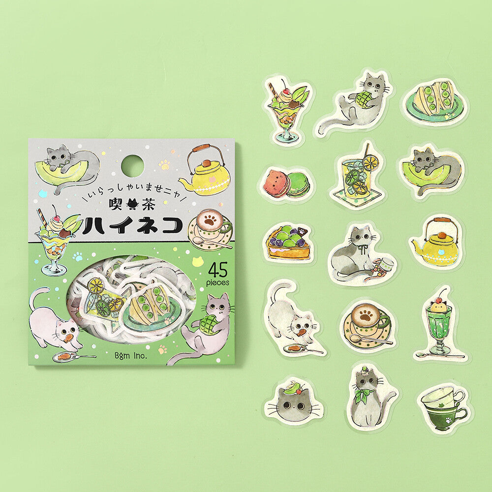 Sticker set with cat-themed designs on a green background