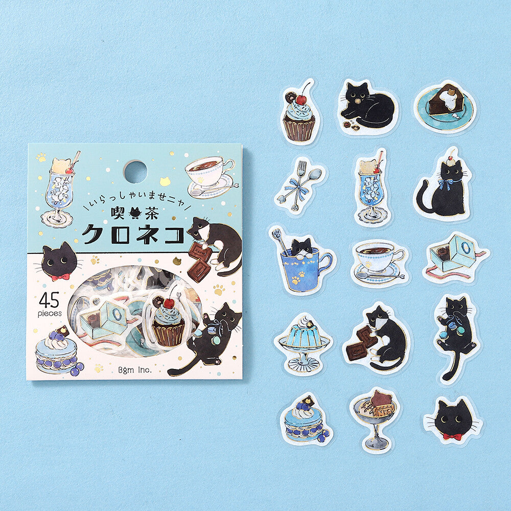 Sticker set with black cat and tea-themed designs on a blue background