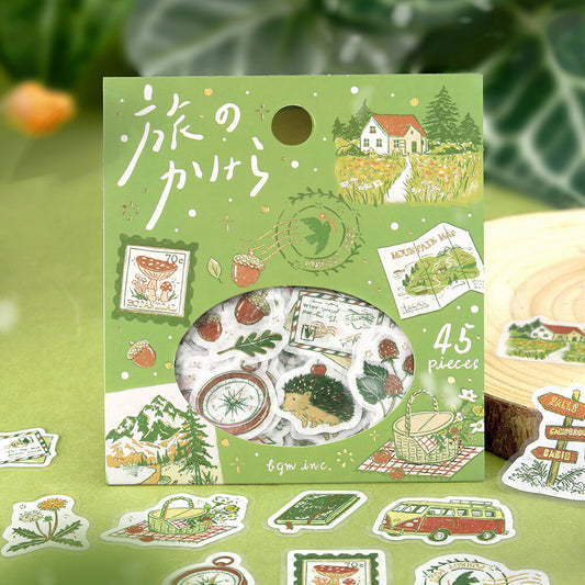 Pack of nature-themed stickers with a green box on a green surface