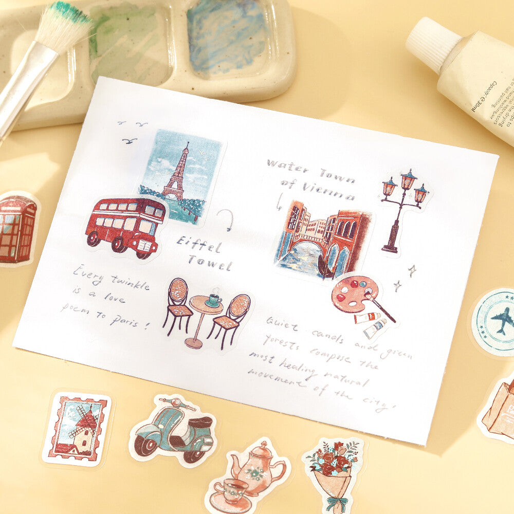 Sheet of illustrated stickers with London-themed designs on a yellow surface.