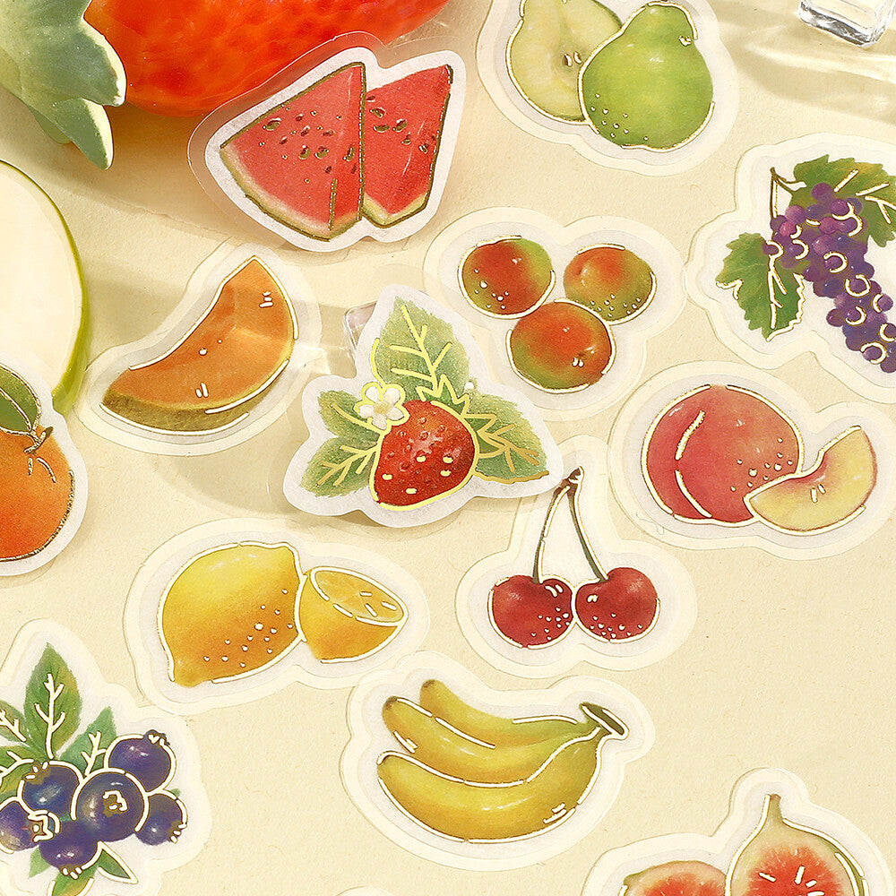 Stickers of various fruits on a beige background