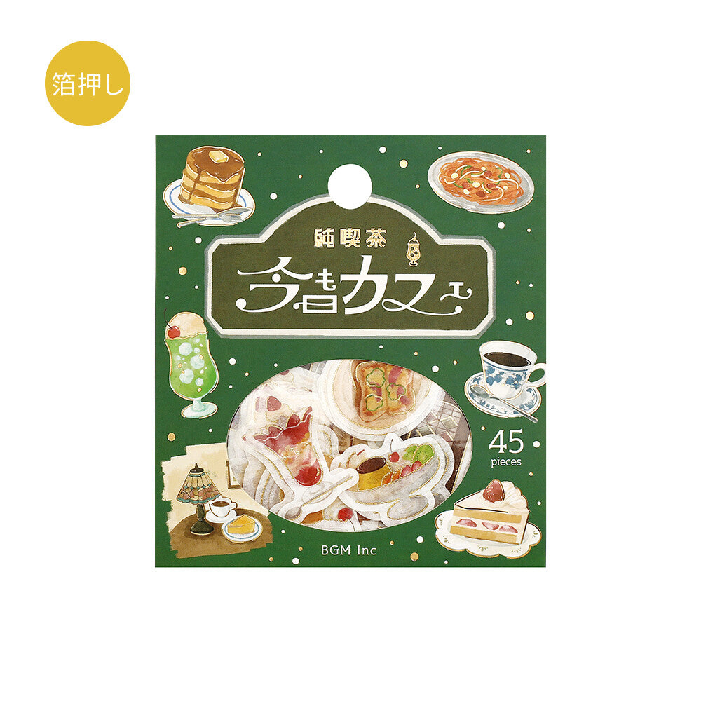 Packaging of a toy set with illustrations of food items on a green background