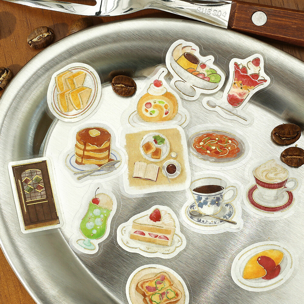 Sticker set of food items on a metal surface