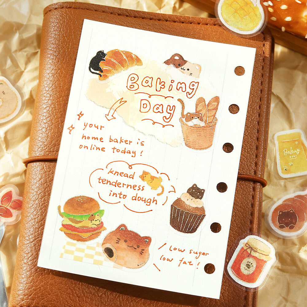 A sheet of paper with stickers of cute cafe items and cats as decoration