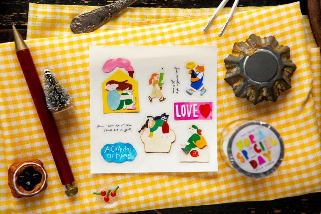 PET sticker elements on a white paper with gingham backgrounds and decorative antiques