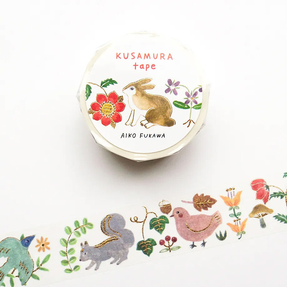 Washi tape roll with illustration of a bunny and forest animals on a white background