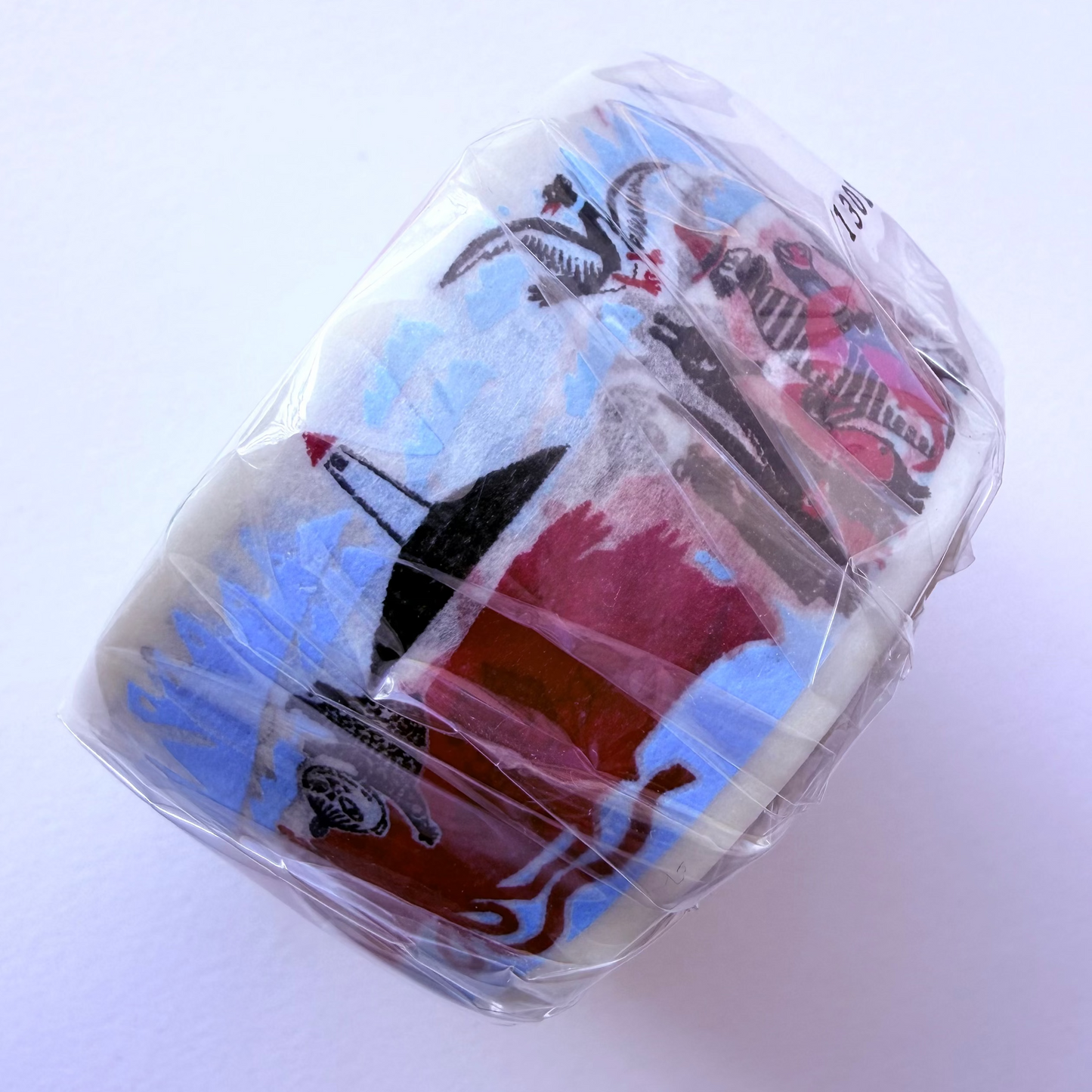 Washi tape roll of Moomin characters on a white background
