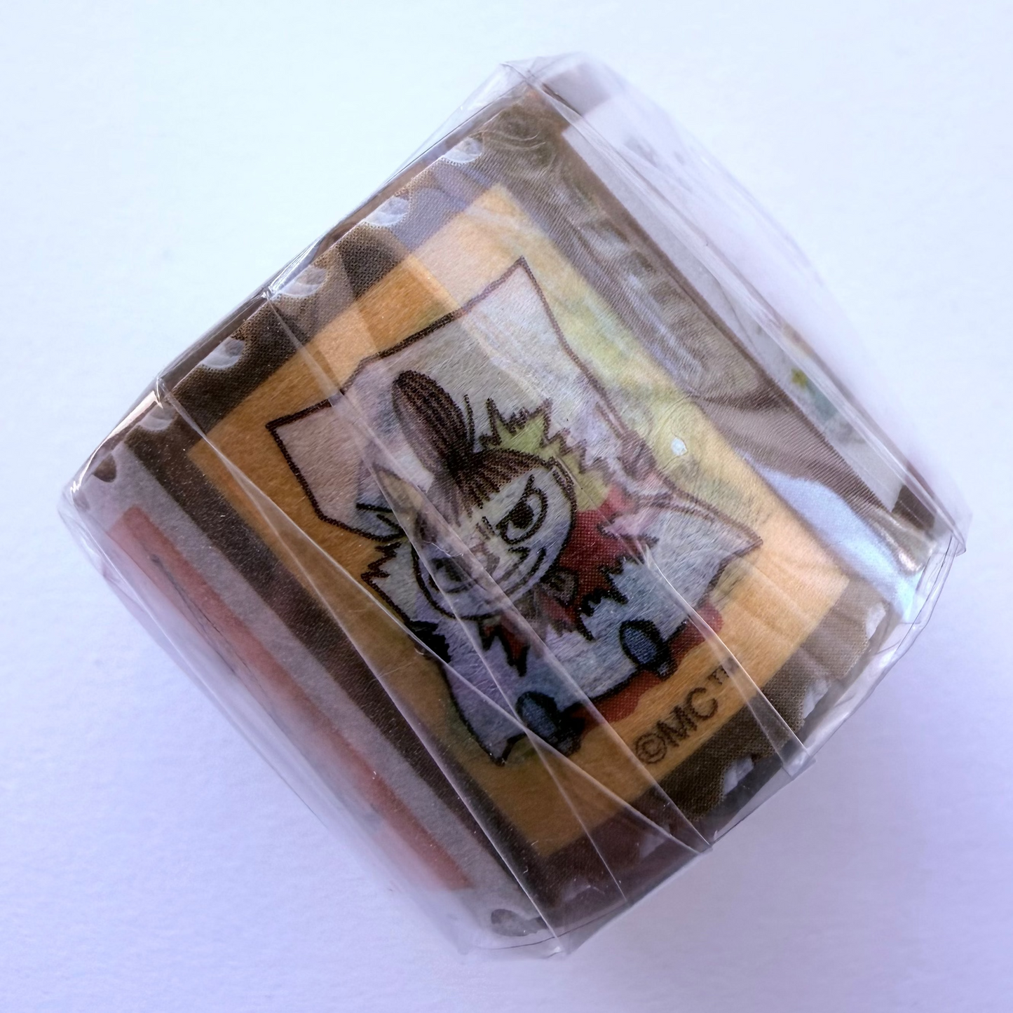Moomin washi tape roll on a white background