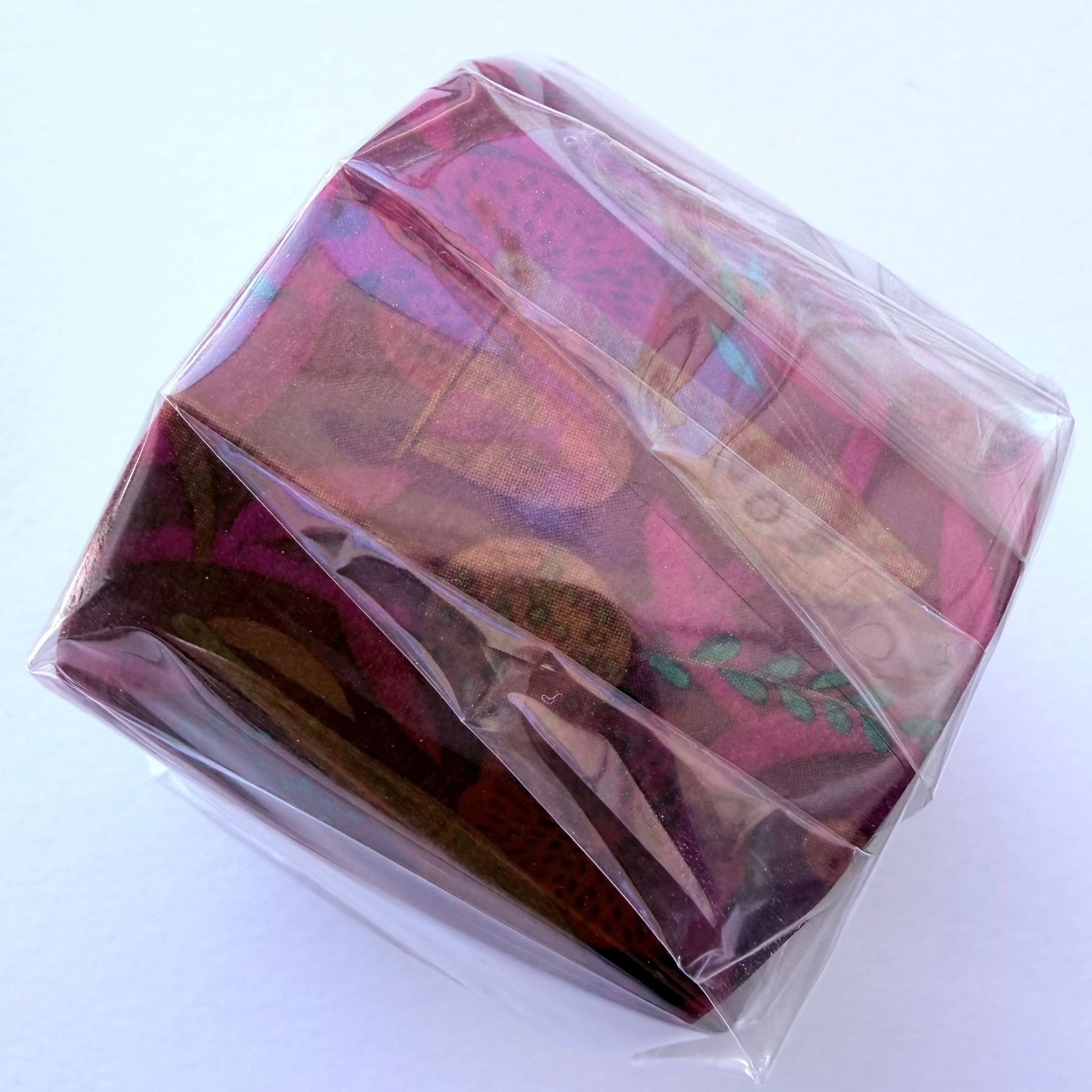 A washi tape roll by MT Masking Tape on a white background