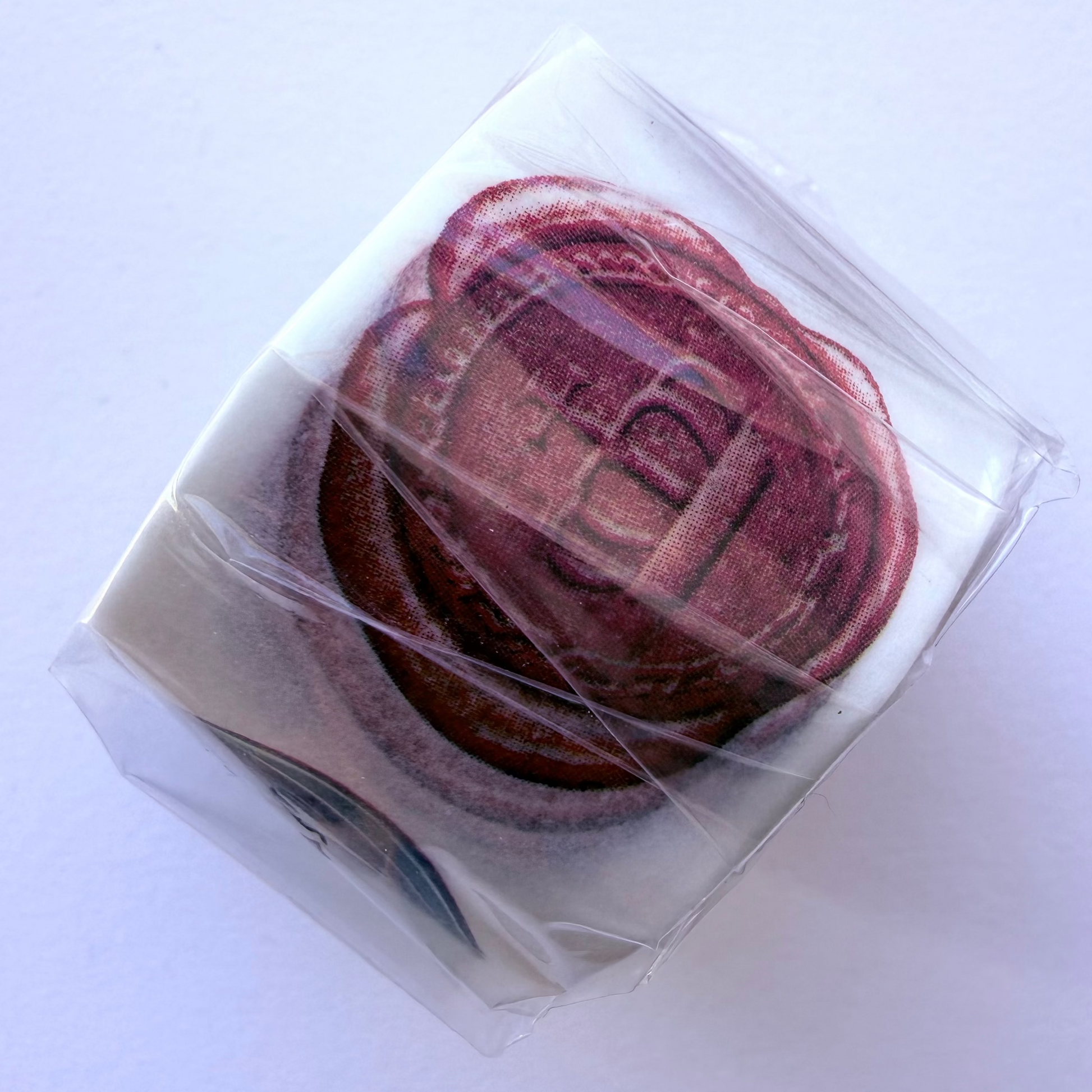 Washi tape roll by MT depicting sealing was stamps on white background