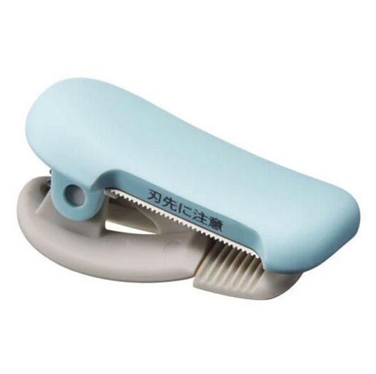 Blue washi tape cutter with a blade on a white background