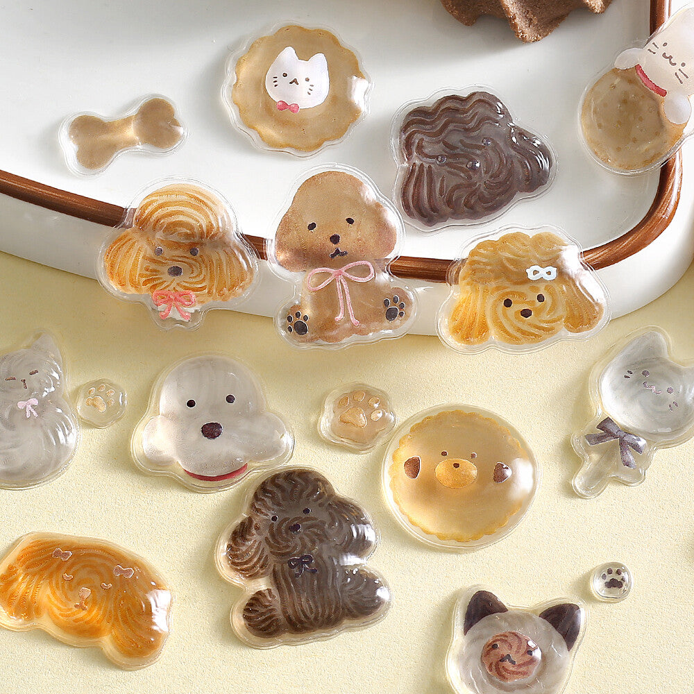 Collection of cute animal-shaped cookies on a white plate.