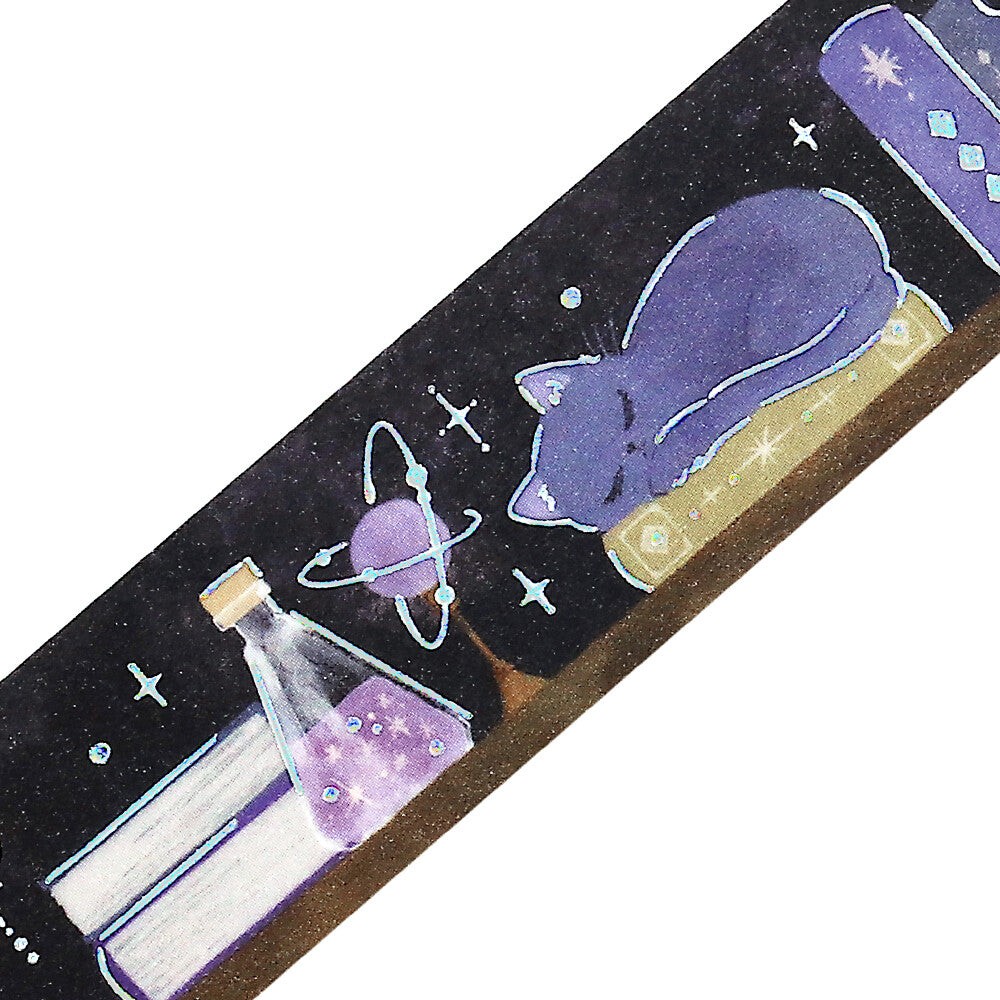 Decorative ribbon with a cat, book, and potion design on a black background.