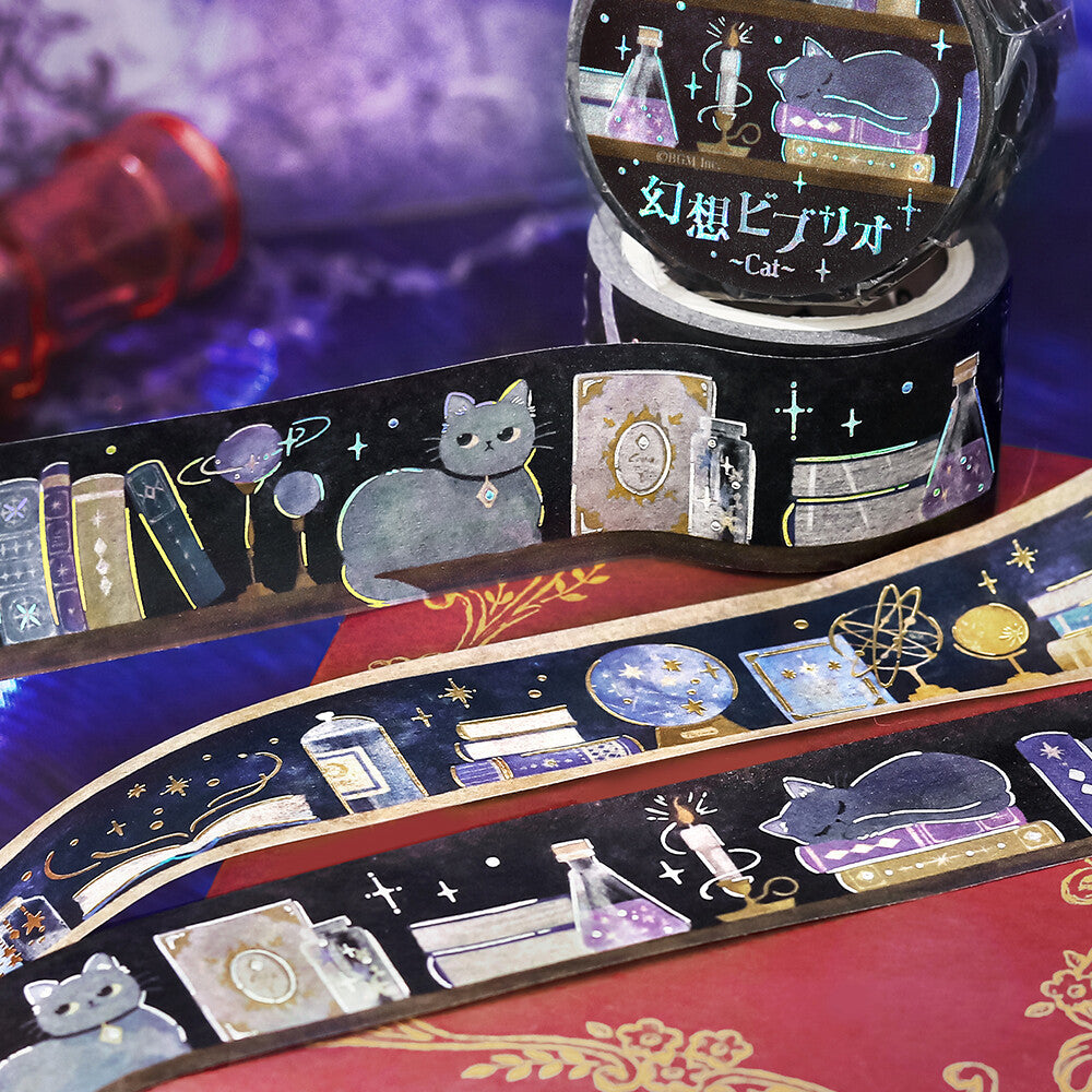 Decorative tape with cat-themed designs on a colorful surface