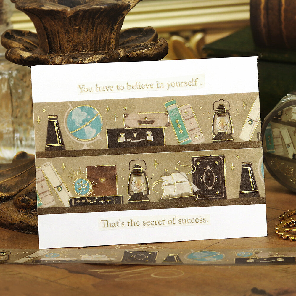 Motivational card with vintage illustrations and text on a wooden surface