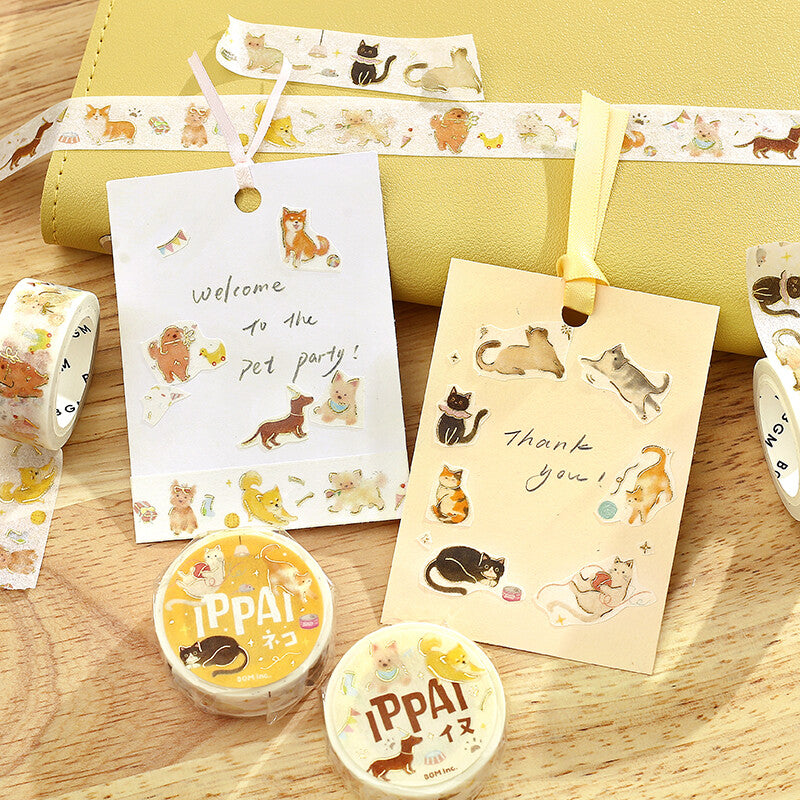 Decorative tags amongst washi tape featuring cats and dogs