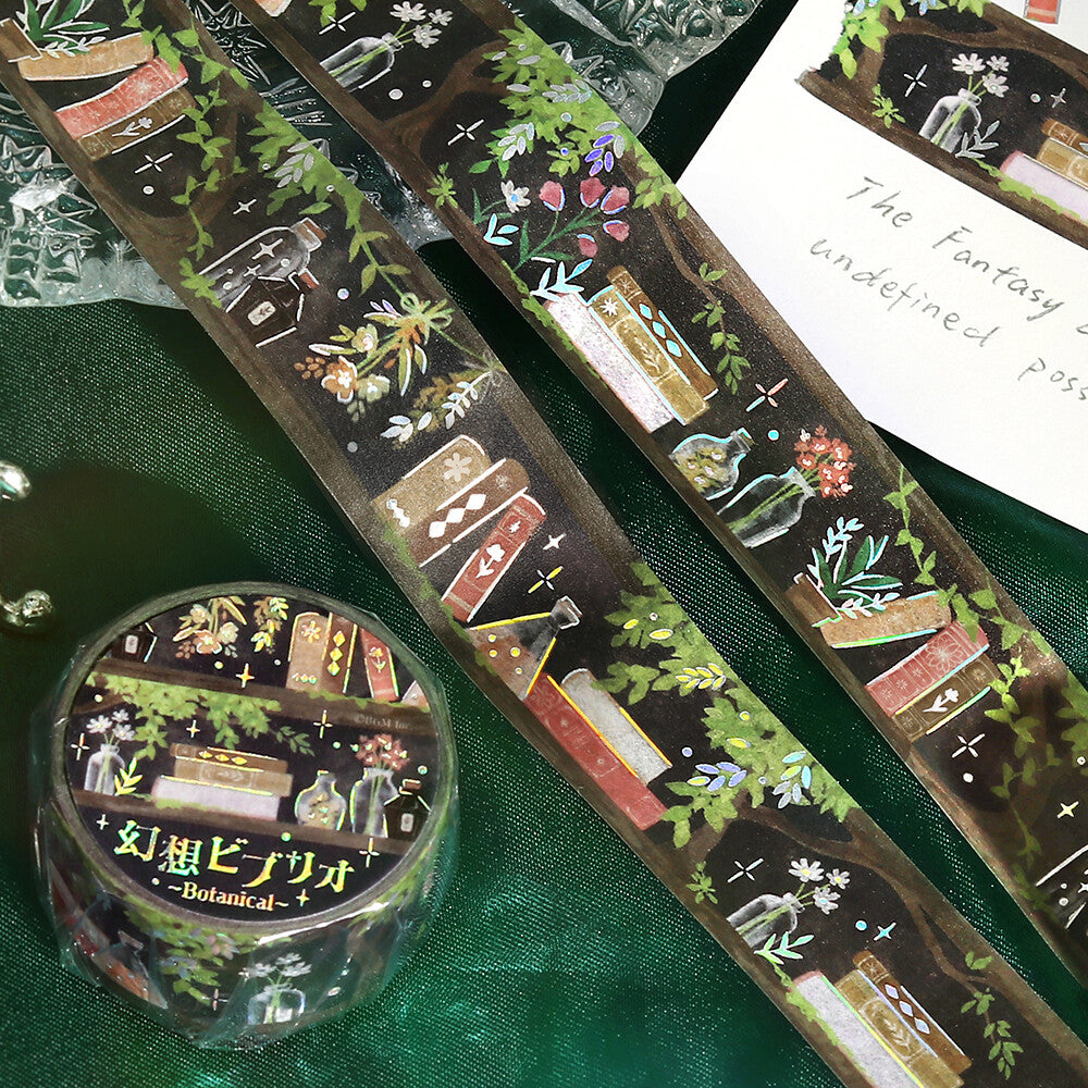 Decorative tape with fantasy-themed designs on a green surface