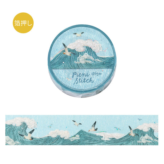Round container with wave and bird design, featuring the brand 'Pieni Stitch'.