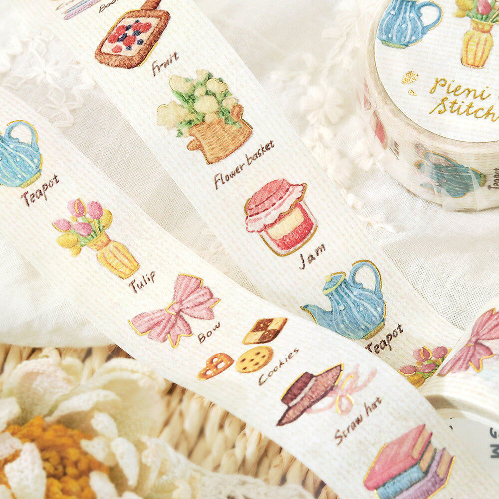 Decorative washi tape rolls with cute illustrations on a white background