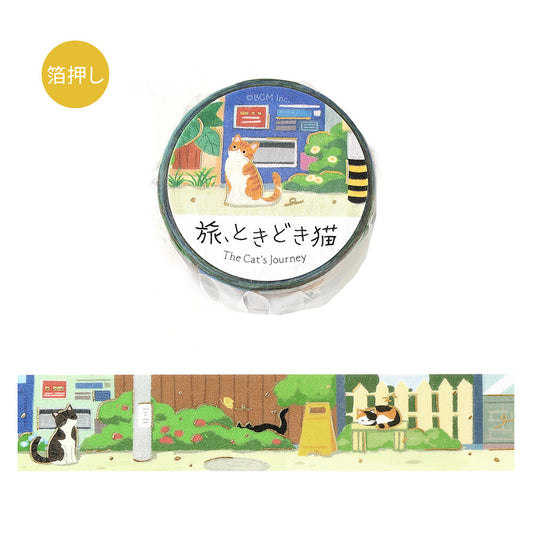 A roll of decorative tape wrapped in clear plastic with a circular label reading 'The Cat's Journey,' shown above an unwrapped strip of the same design. The tape features cat silhouettes sitting on benches on the street
