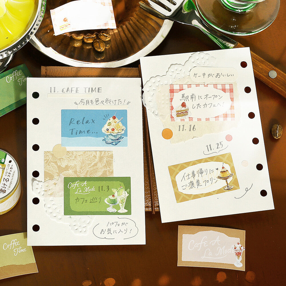 Set of decorative cards with text and graphics on a wooden surface