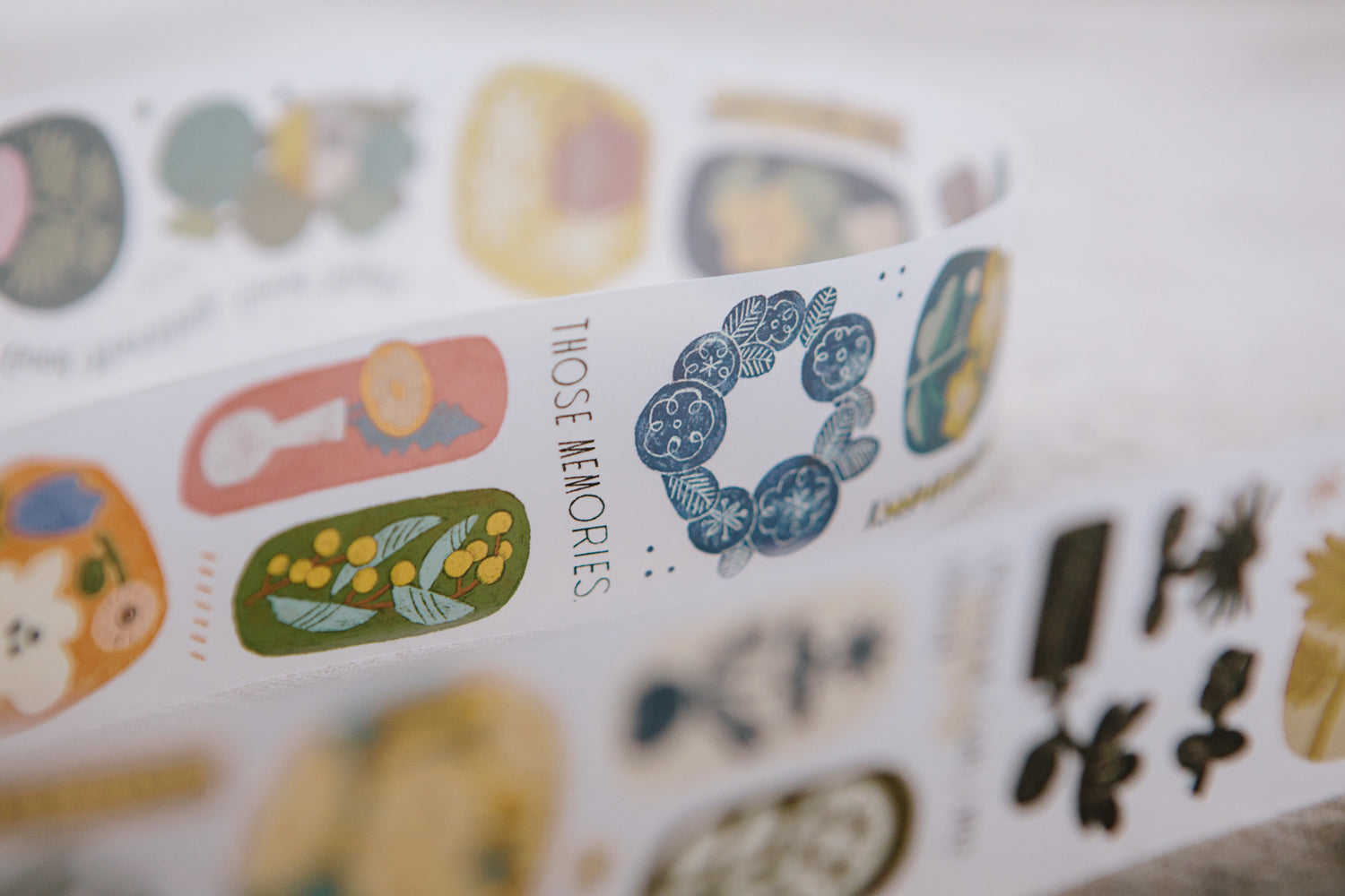 Decorative sticker sheet with various designs and text on a white background