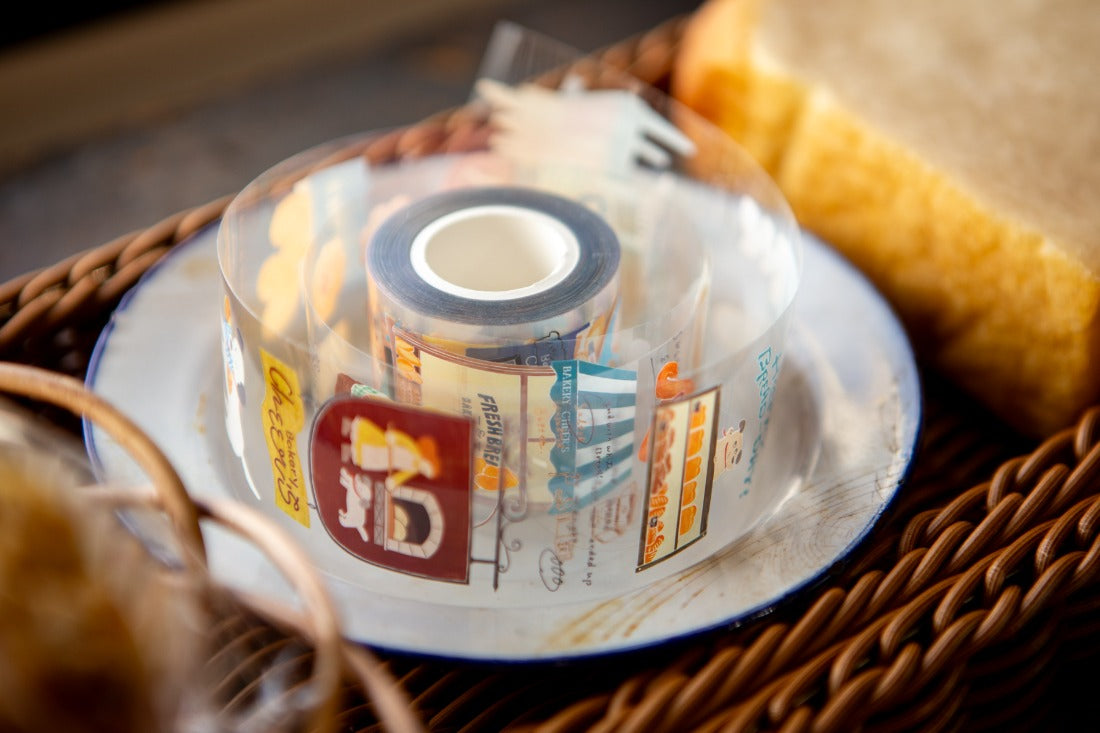 Clear plastic container with a label on a woven surface
