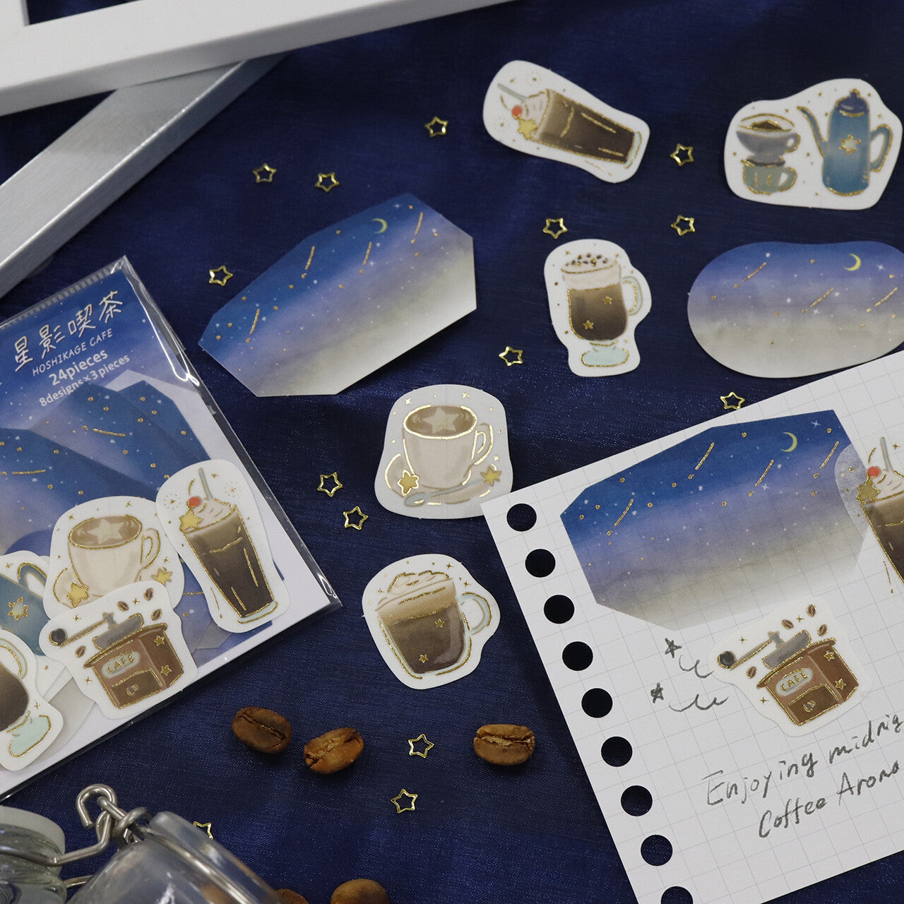 Sticker set with coffee-themed designs on a dark blue surface.