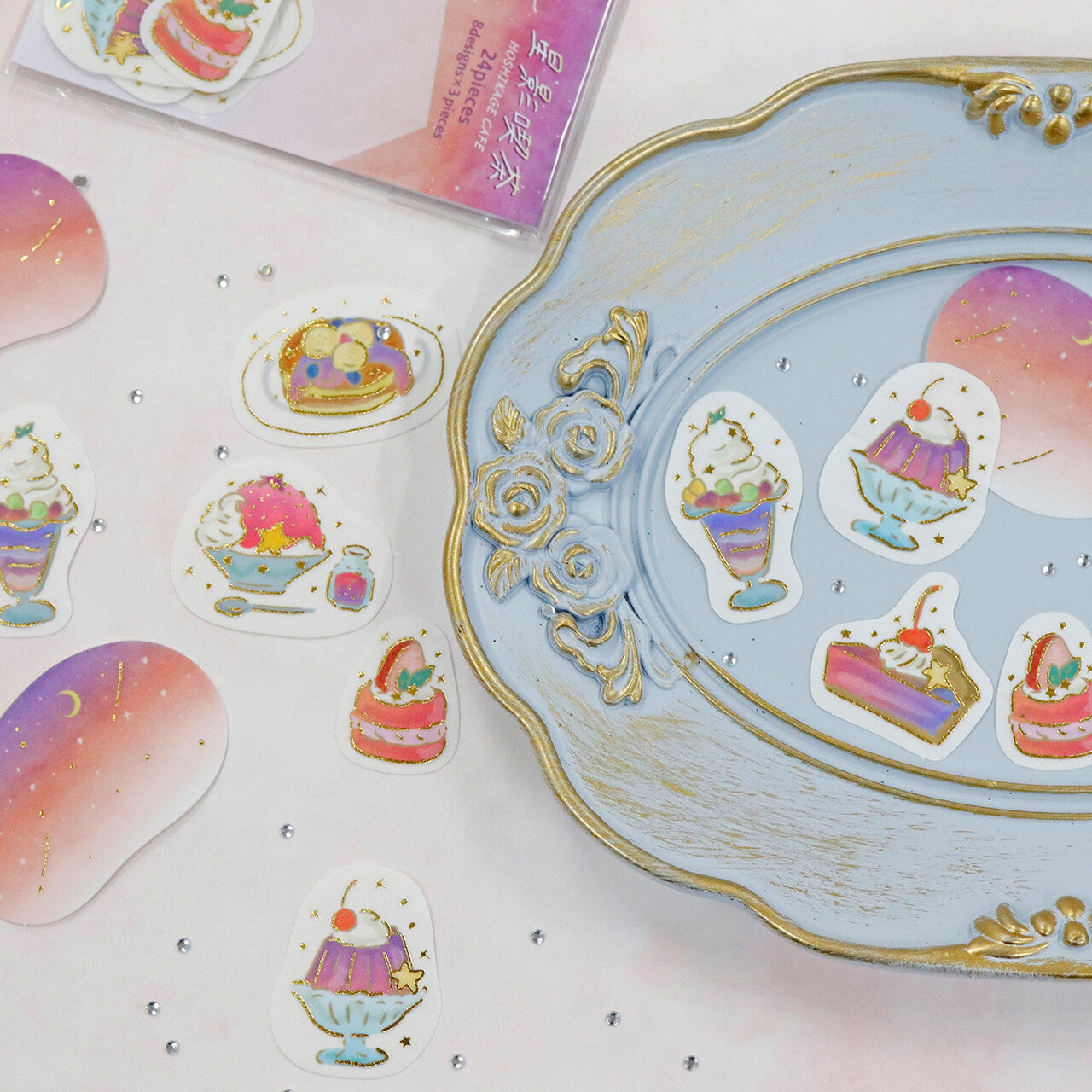 Decorative plate with dessert-themed stickers on a white surface