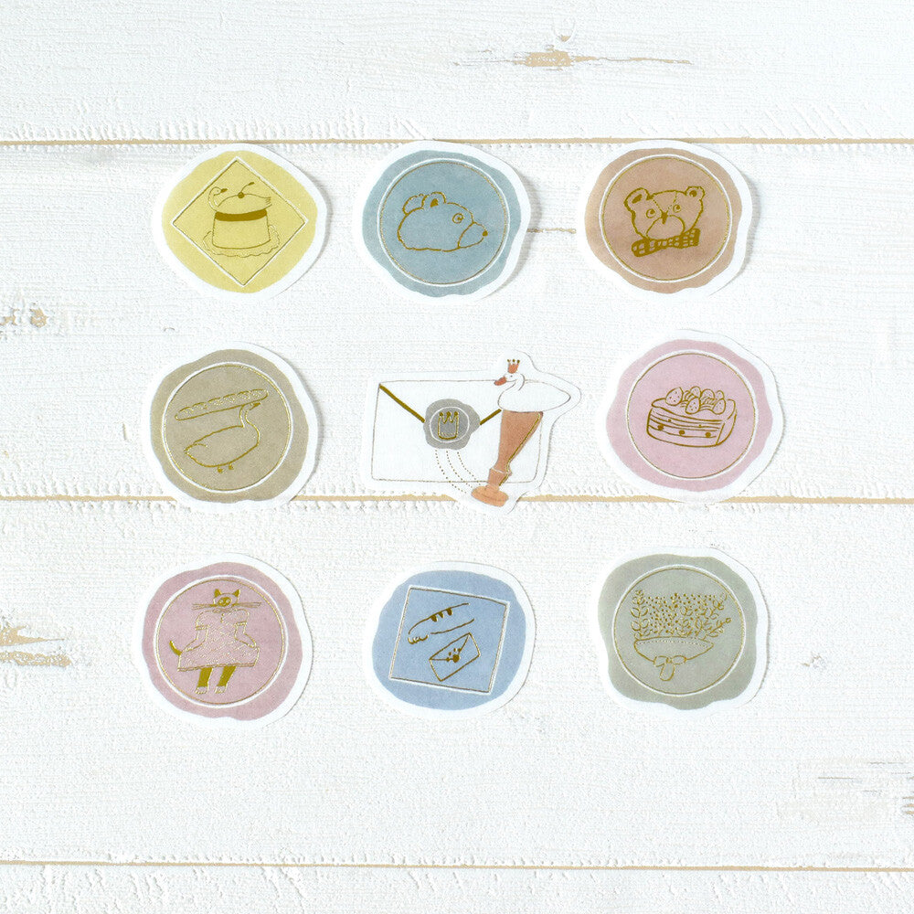 9 stamping stickers on wooden background