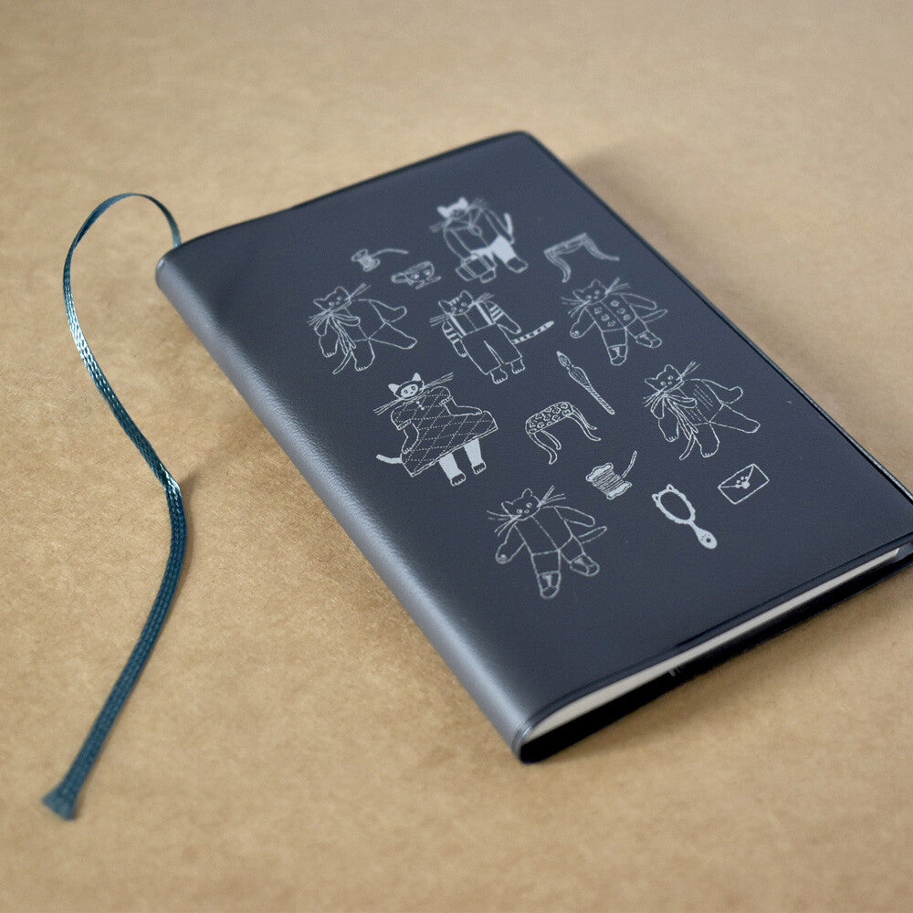 Papier Platz notebook with blue plastic cover on natural paper background