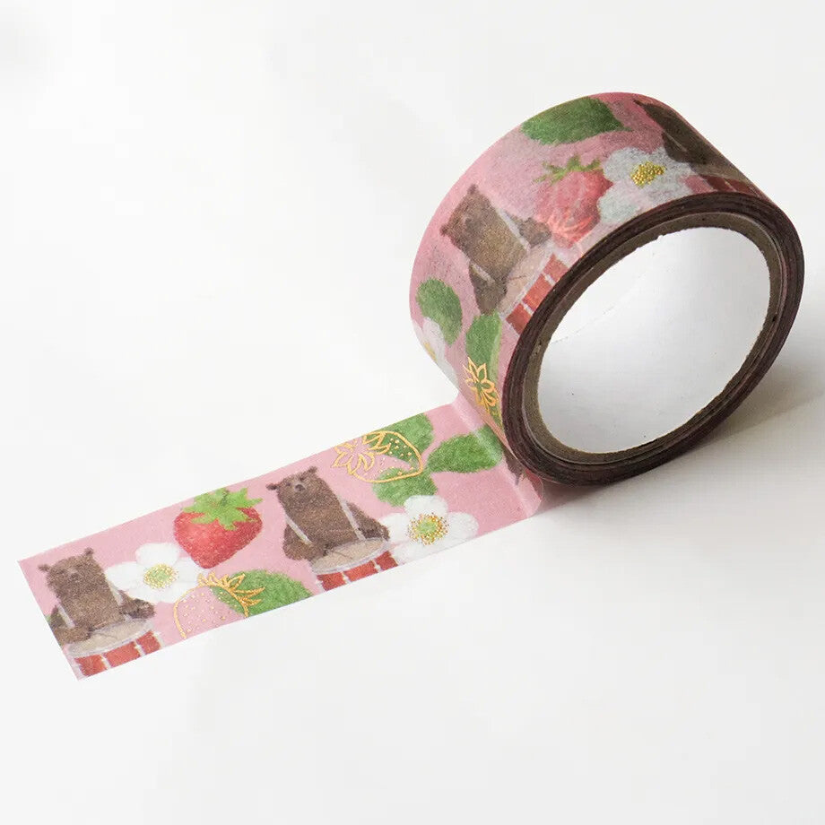 Washi tape roll featuring illustrations of 2 bears playing the drums on a white background