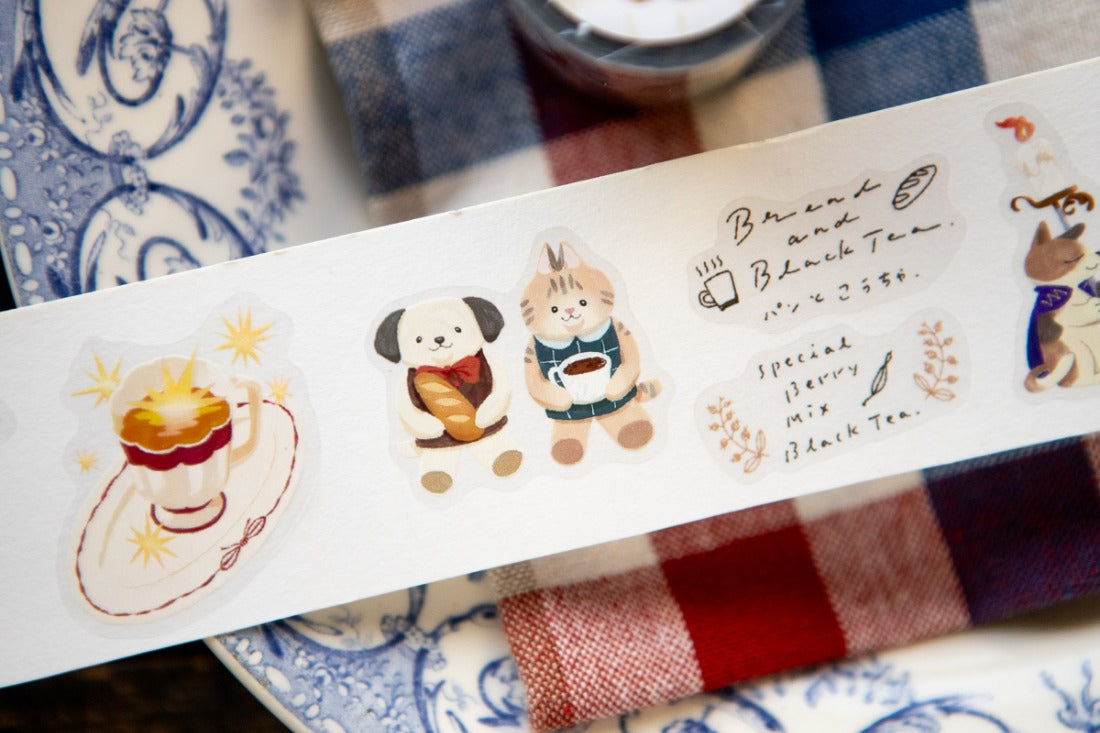 Loop of PET sticker illustrations of cats drinking tea on a towel background
