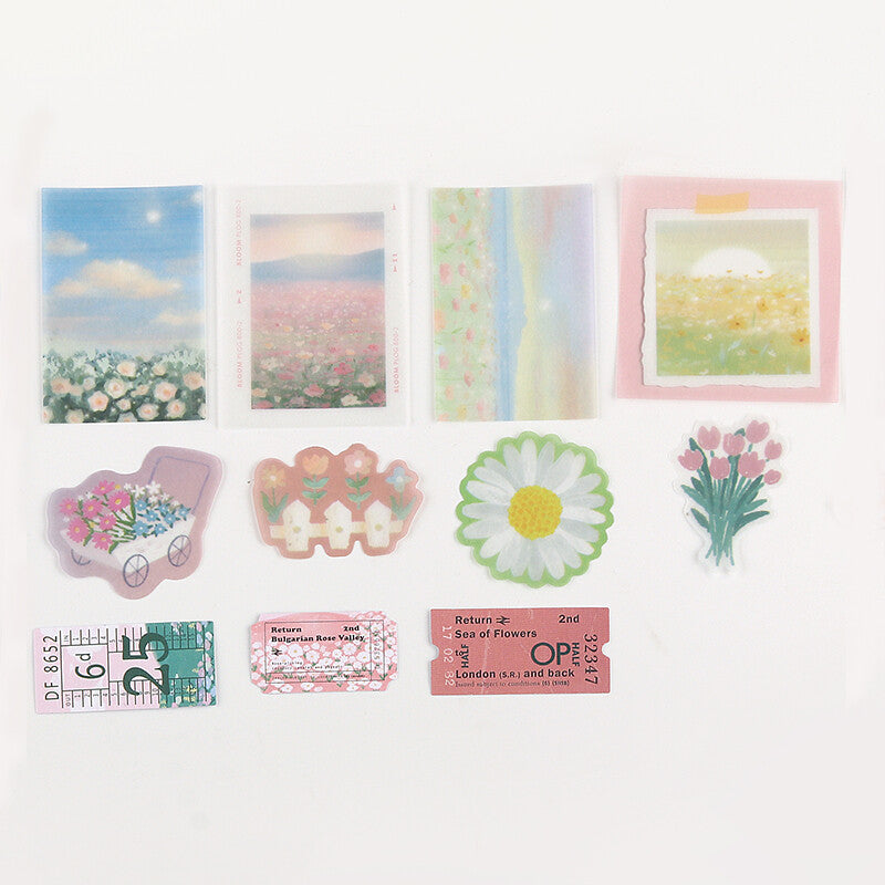 Set of decorative stickers with floral and scenic designs on a white background