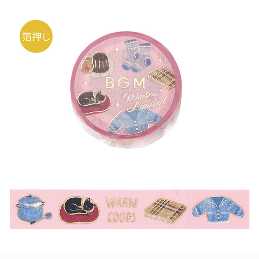 Pink washi tape roll with decorative designs on a white background