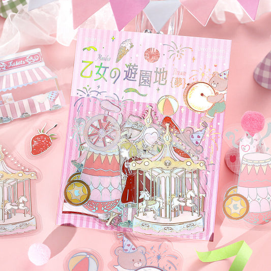 Pack of stickers with a pink theme featuring a carousel and other decorative elements on a matching pink background.