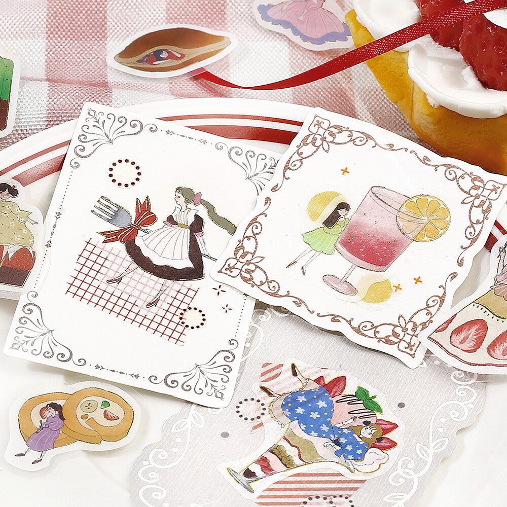 Illustrated cards with decorative designs and characters on a white surface.