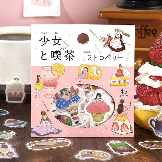 Packaging of illustrated stickers with characters and graphics on a wooden surface.