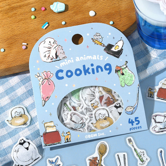 Packaging of mini animal stickers themed around cooking on a checkered tablecloth.