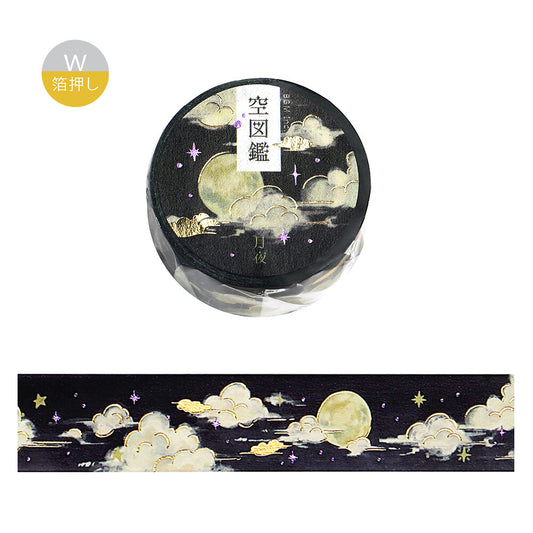 Decorative tape with moon and cloud design on a black background