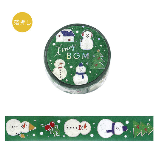 Decorative washi tape with Christmas-themed design featuring snowmen and trees on a green background.