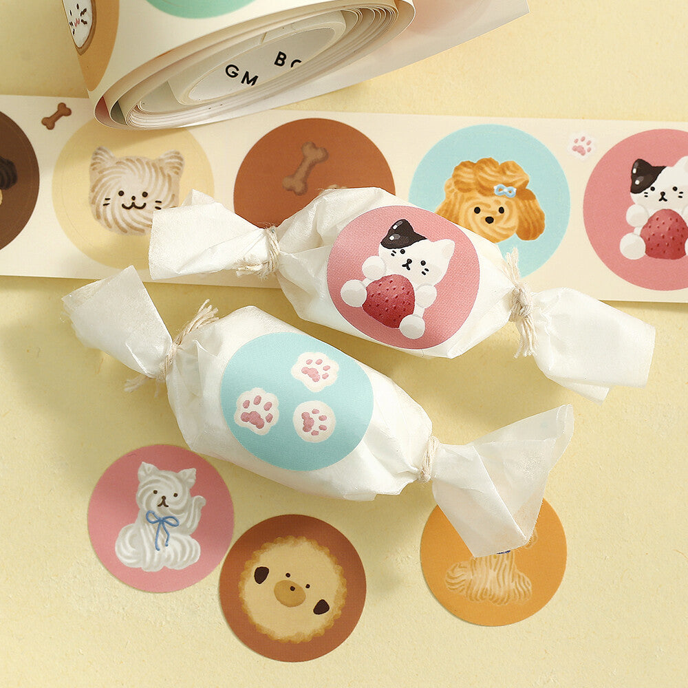 Candies with cute animal stickers on a yellow background