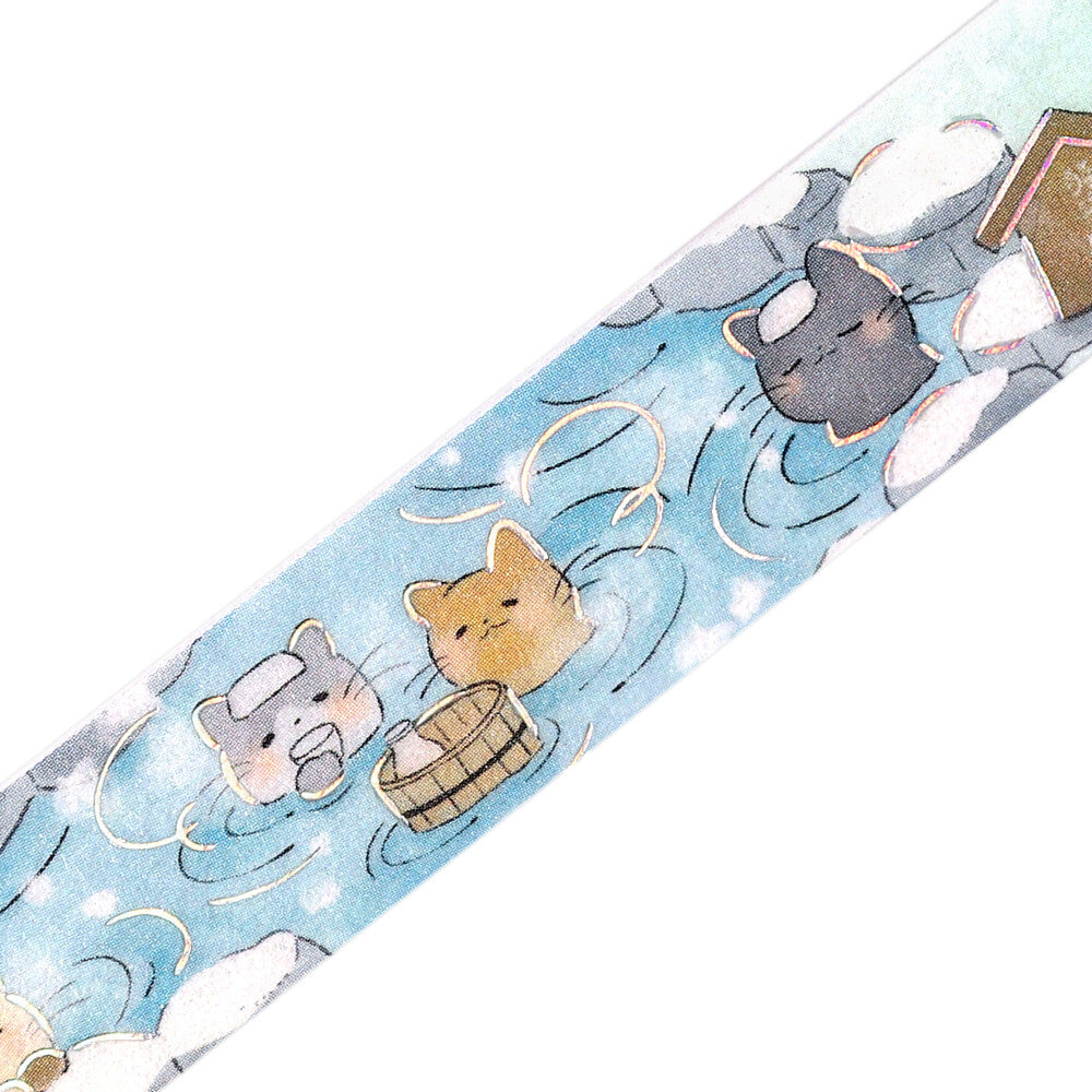 Washi tape with cat illustrations on a light blue background
