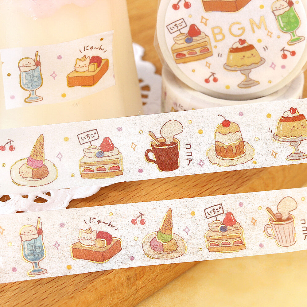 Decorative tape with cartoon food illustrations on a wooden surface