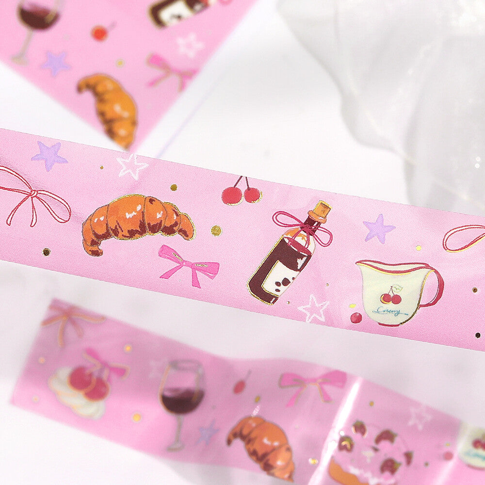 Pink washi tape with cute illustrations on a white background