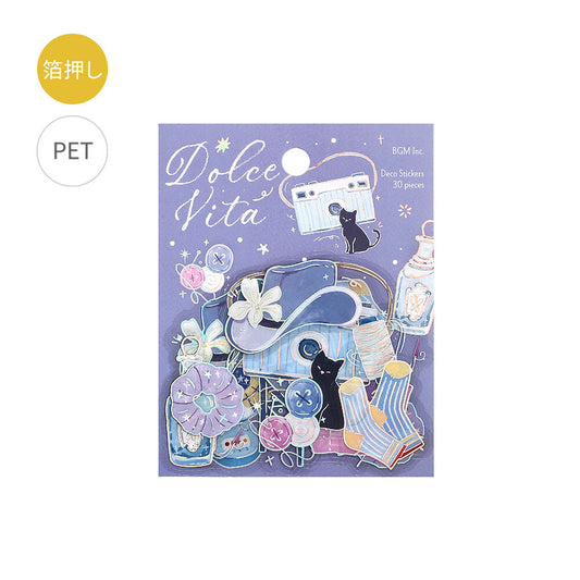 Pack of 'Dolce Vita' stickers with illustrations on a purple background