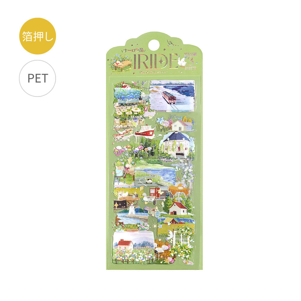 Packaged stickers with scenic designs on a green background