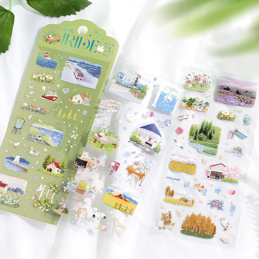 Set of decorative stickers with nature and farm designs on a white surface.