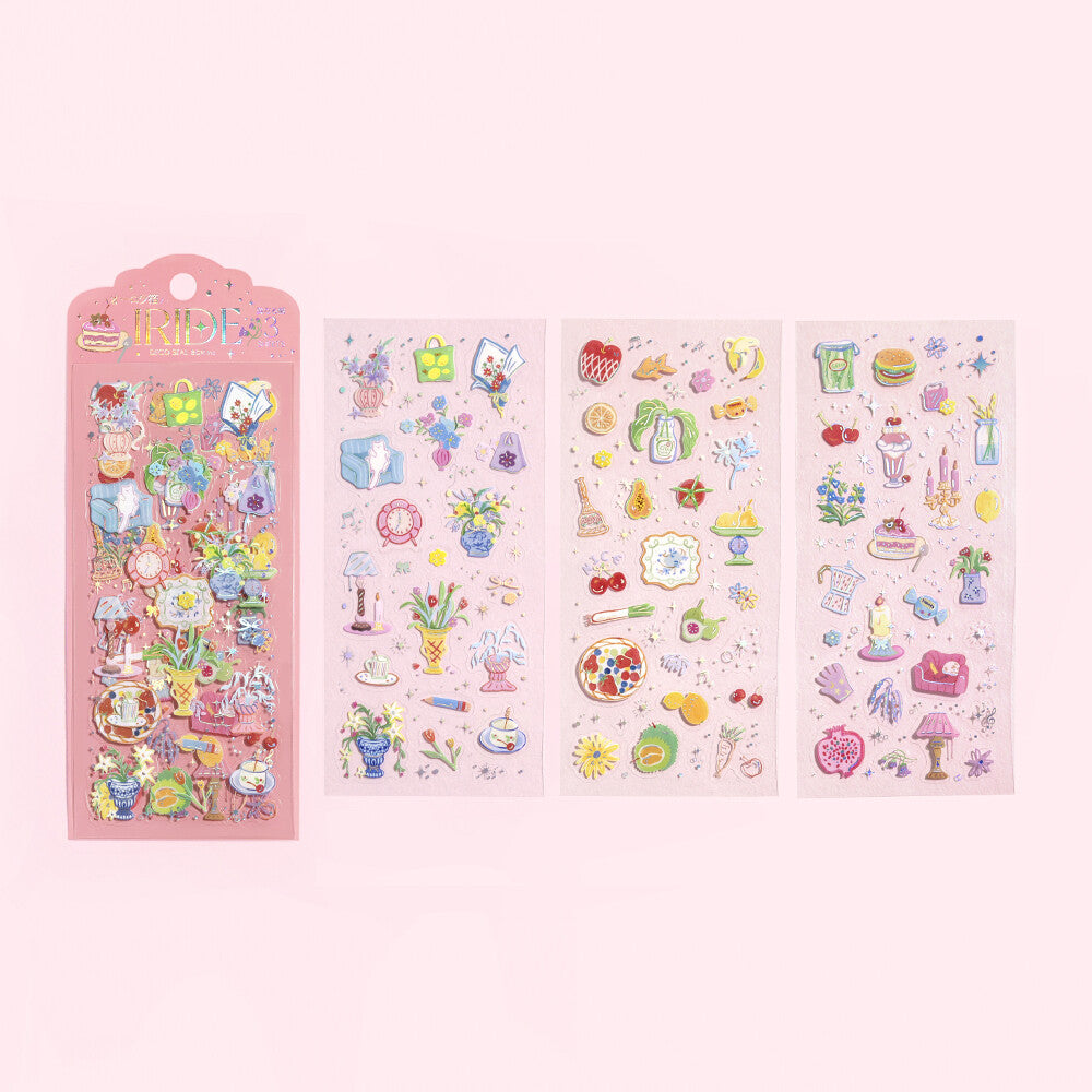Set of colorful stickers on pink paper with a pink holder on a white background